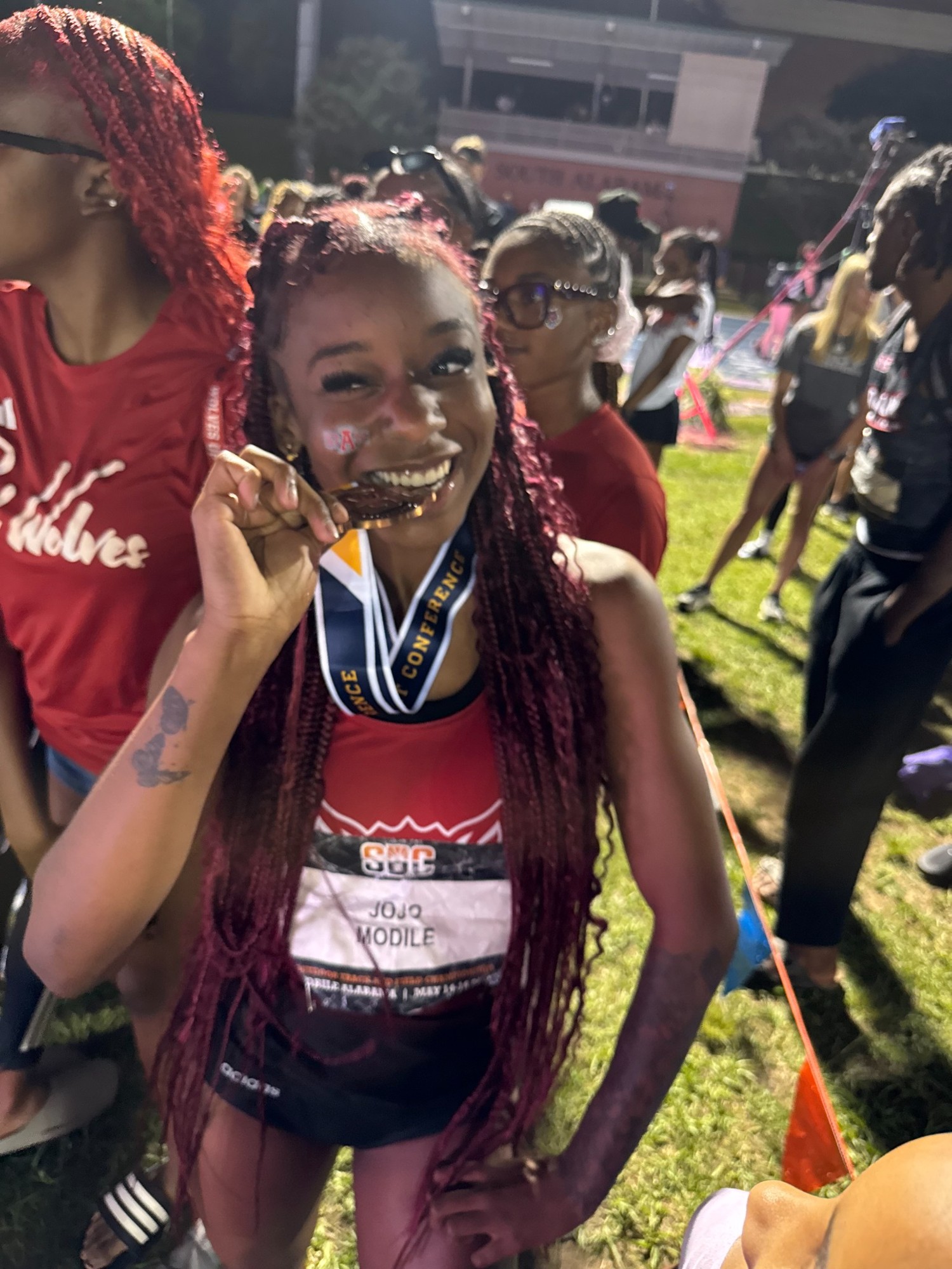 Jojo Modile celebrating with her medal