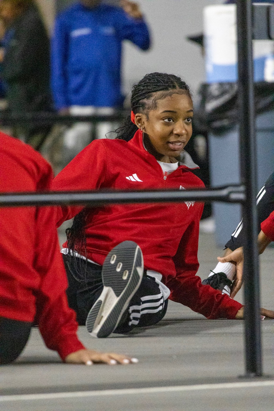 Jojo Modile stretching before competition